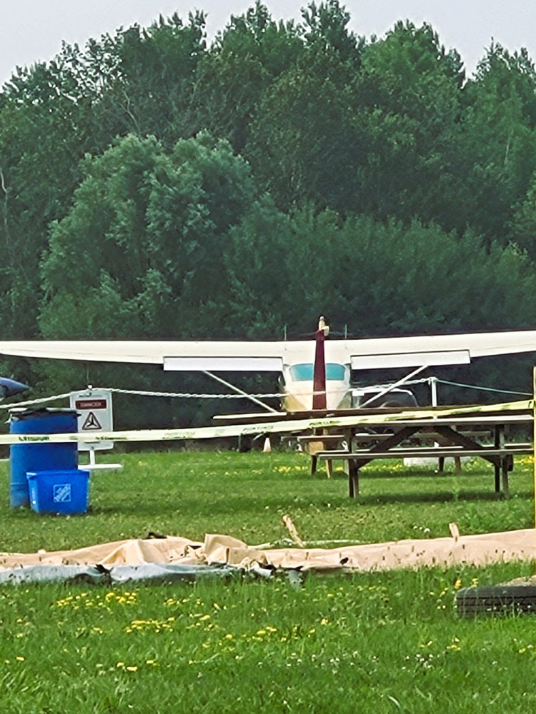 Yellow plane in the field at Skydive Toronto
